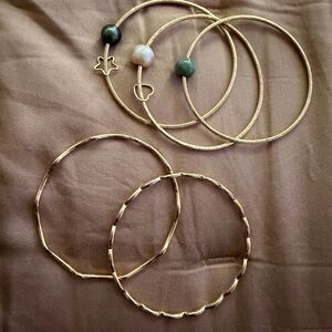 Gold filled set of 5 bangles made in Hawaii.